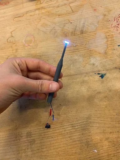 The Mark XI prototype held in a hand
